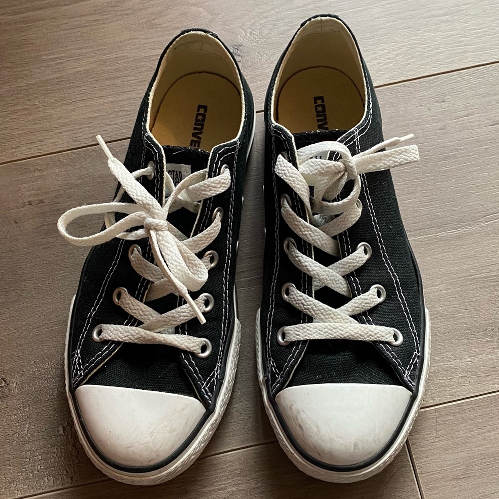 Converse black low top